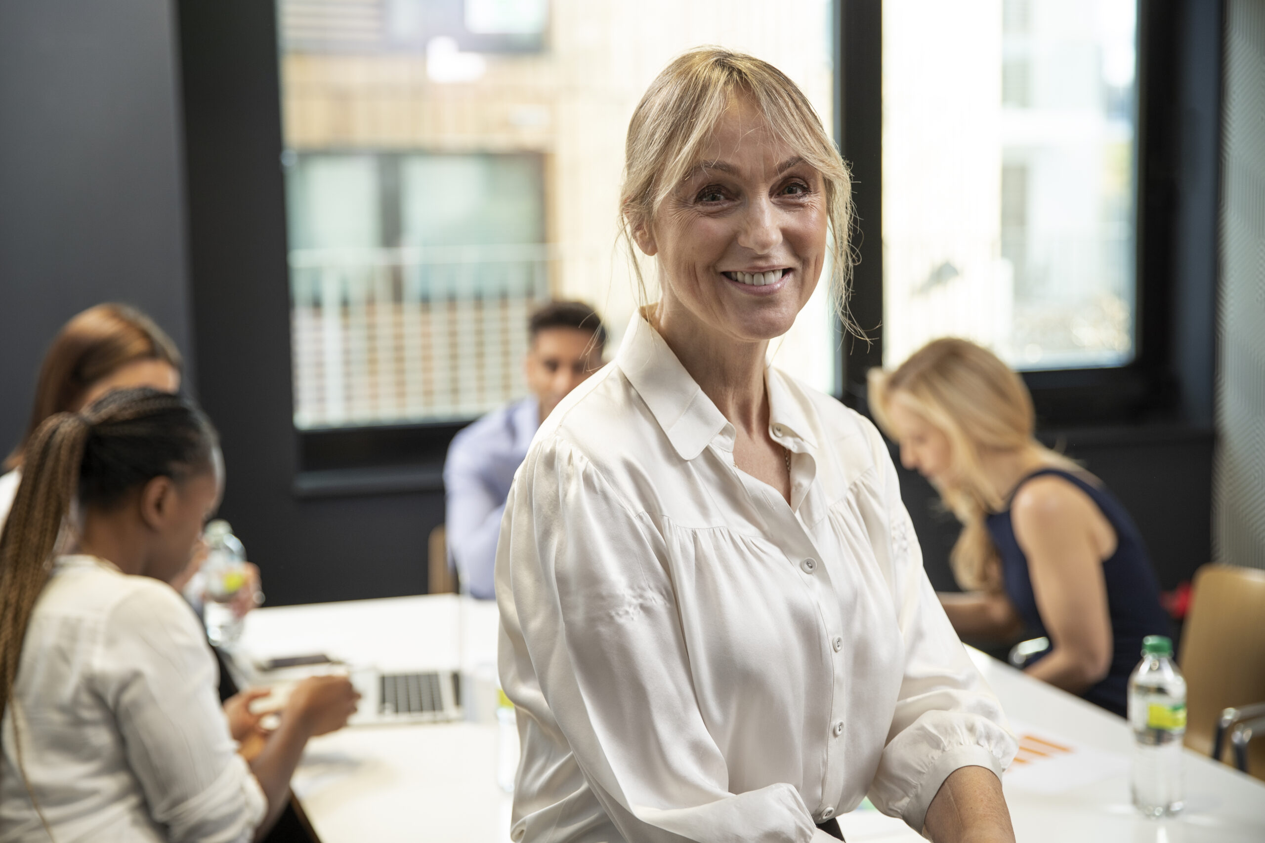 medium shot empowered business woman office